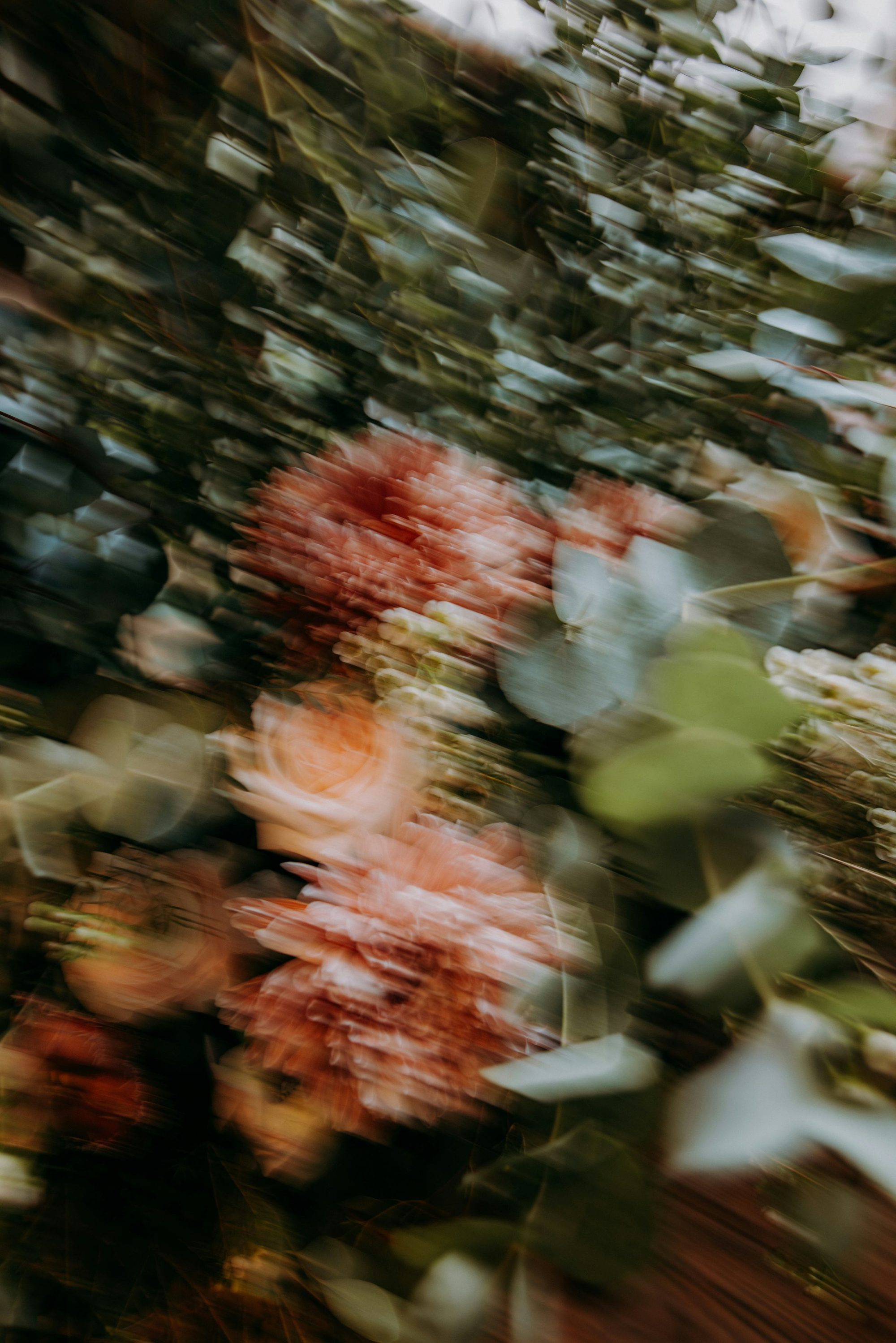 Motion-blurred florals, evoking the studio's sensory, spatial approach to sound